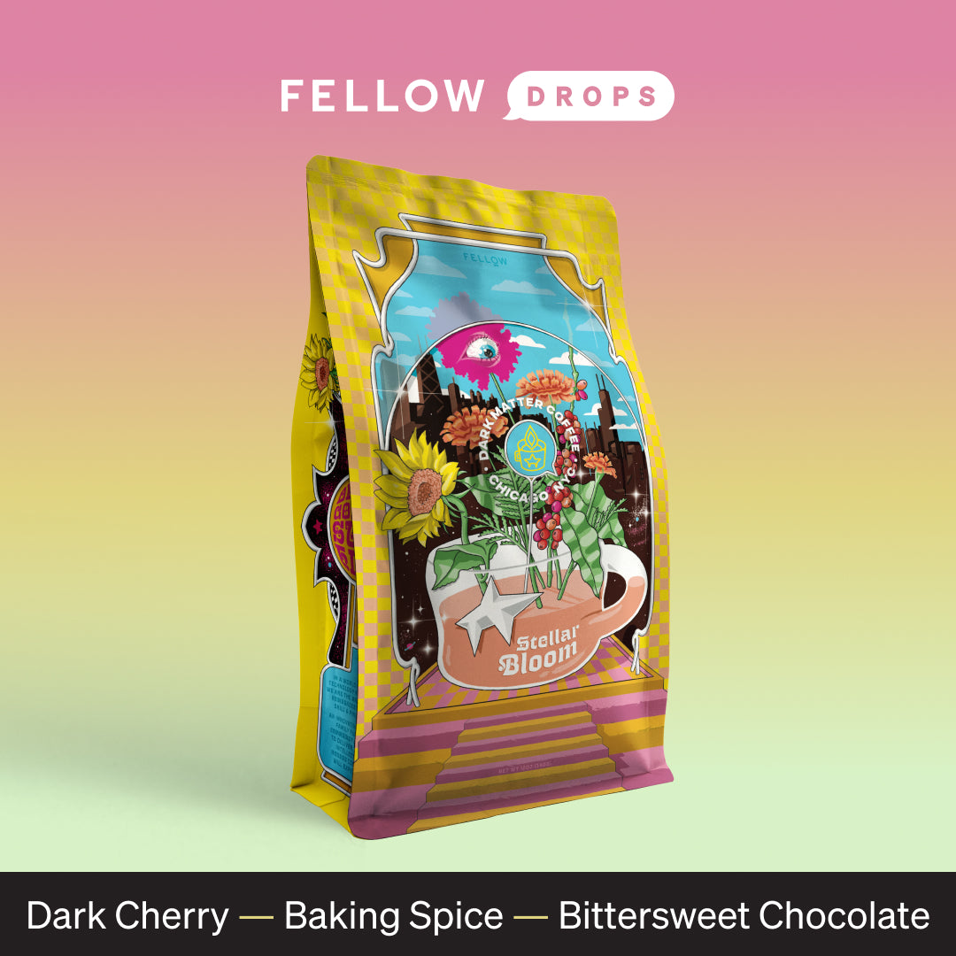 Bag of Dark Matter Coffee Stellar Bloom with colorful floral design, flavor notes below.