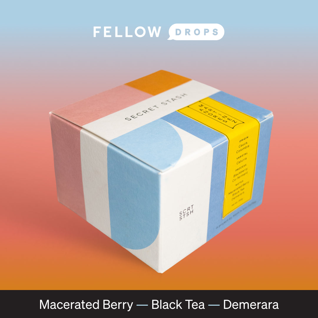 Cube-shaped coffee box with colorful design, labeled Andres Martinez by Mom 'n 'em Coffee.