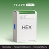 A box labeled HEX Coffee Roasters Víctor Florez Chiroso: honeydew, tangerine blossom, cherry.