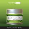 A tin of Heavenly Tea Leaves Organic Ceremonial Grade Matcha on a green gradient background.