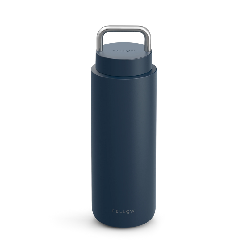 Navy Carter Carry Travel Mug by Fellow with metal handle and logo near base.