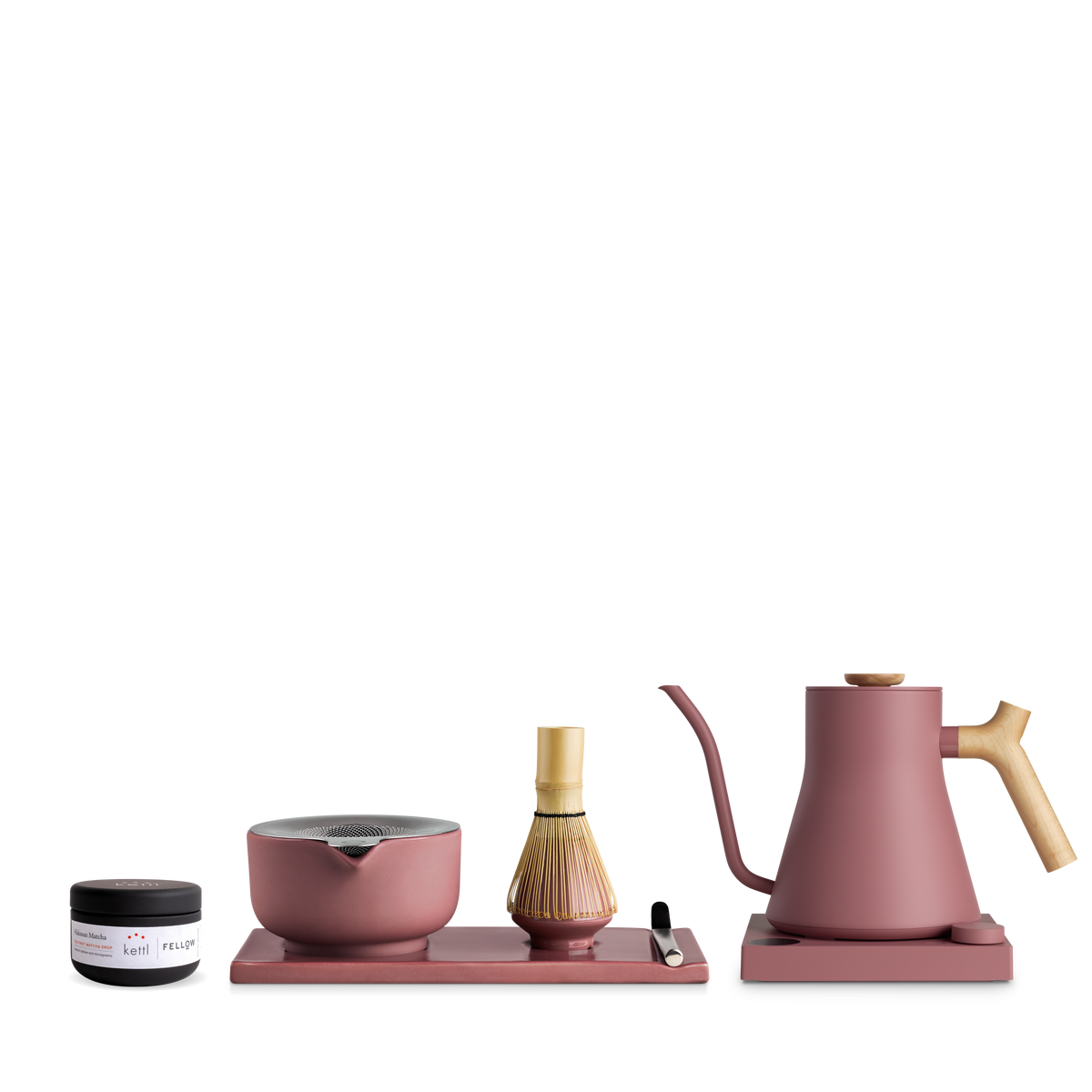 The Kettle + Matcha Kit by Fellow: pink kettle, whisk, bowl, scoop, tea tin, and tray.