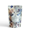 Methodical Coffee’s Berry Spice, a medium-light roast, in a floral-patterned bag on white background.