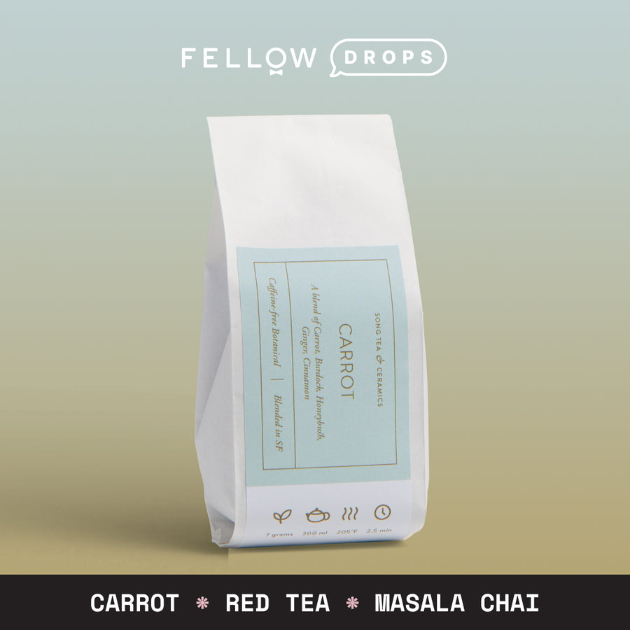 A white Song Tea & Ceramics Carrot bag with uncaffeinated tea notes on a gradient background. - media