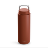 Matte brown Fellow Carter Carry Travel Mug with a metal handle on the lid.