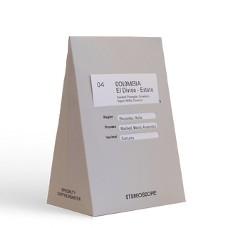 Grey coffee bag labeled stereoscope Colombia - Finca El Diviso - Estate with tasting notes.