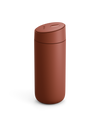 The Fellow Carter Slide Mug is a matte brown travel mug with a seamless, rounded design and lid.