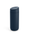 The Fellow Carter Slide Mug is dark blue with a matte finish and a rounded, spill-proof lid.