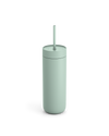 The Fellow Carter Cold Tumbler in matte light green with a straw on a white background.