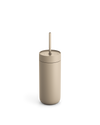 Fellow Carter Cold Tumbler in beige with lid and straw shown on a white background.