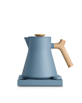 Fellow Corvo EKG Electric Kettle: fast, all-purpose blue kettle with wooden handle and base.