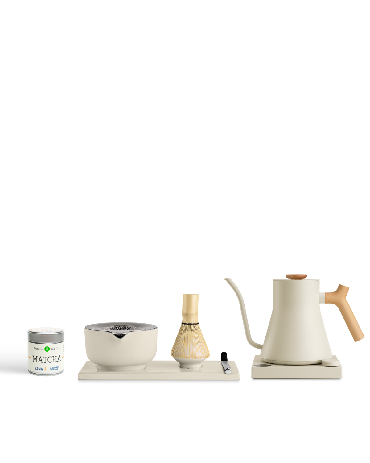 A Fellow The Kettle + Matcha Kit including a bowl, strainer, whisk, and gooseneck electric kettle.