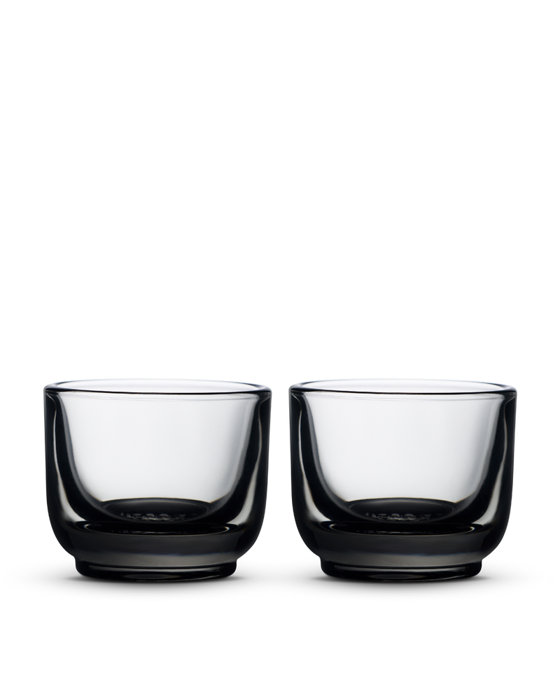 Two Fellow Pirch Espresso Glasses, thick-based, side by side on a white background.