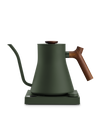 Fellow Stagg EKG matte green electric kettle with wood handle, gooseneck spout, and base.