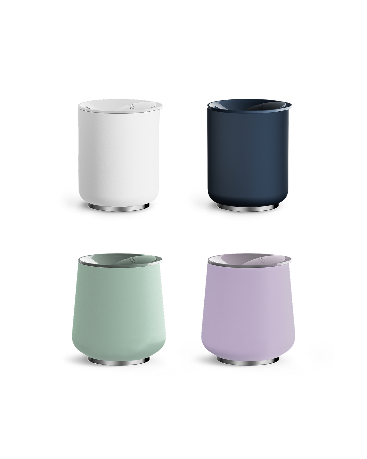 Four modern Fellow Stiff Drink Set tumblers in white, navy, mint green, and lavender.