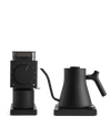 Fellow's The Electric Kit: sleek black kettle and grinder for home baristas, white background.