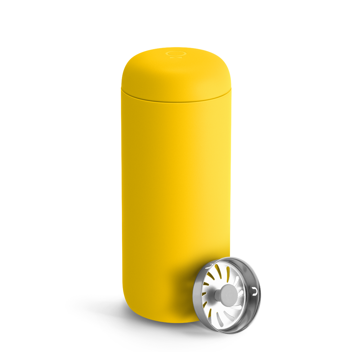 Fellow Carter Move Mug in Lemon Zest with rounded edges and a metal strainer in front.