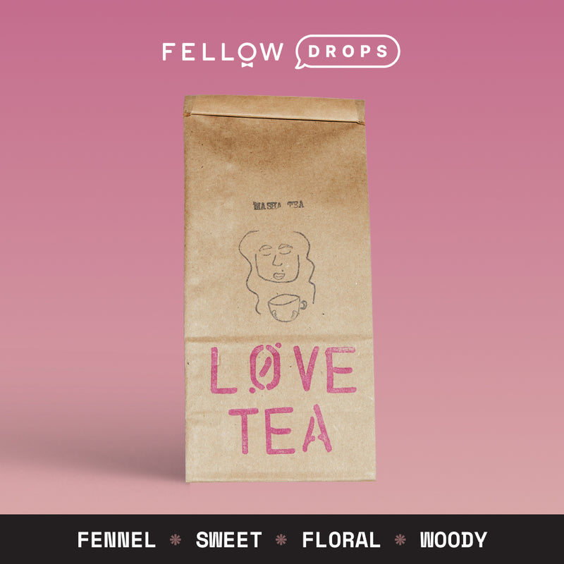 A Fellow Love herbal tea bag on pink, brown pack, with Masha tasting notes below.