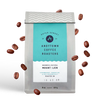 A bag of Andytown Coffee Roasters Indonesia Natural Mount Ijen with coffee beans floating around.