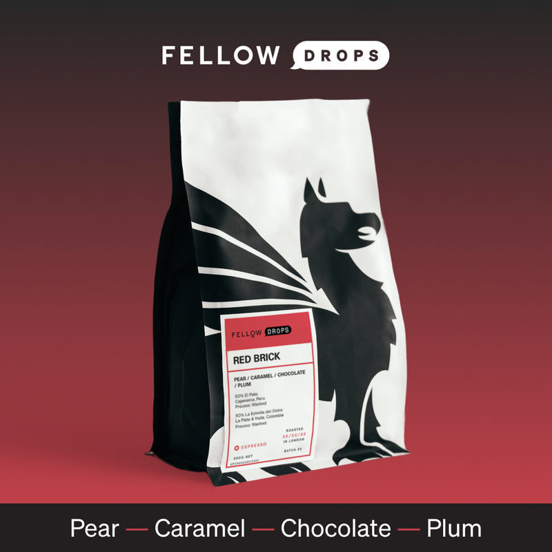 Fellow Red Brick medium roast coffee with wolf; notes of pear, caramel, chocolate, and plum.