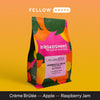 A colorful Broadsheet bag of Ethiopia: Hambela EA Decaf with notes of crème brûlée, apple, raspberry jam.