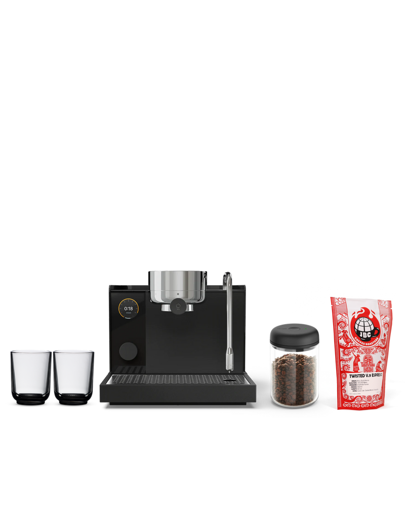 Fellow Father's Day Bundle: black espresso machine, two cups, coffee beans, espresso blend.
