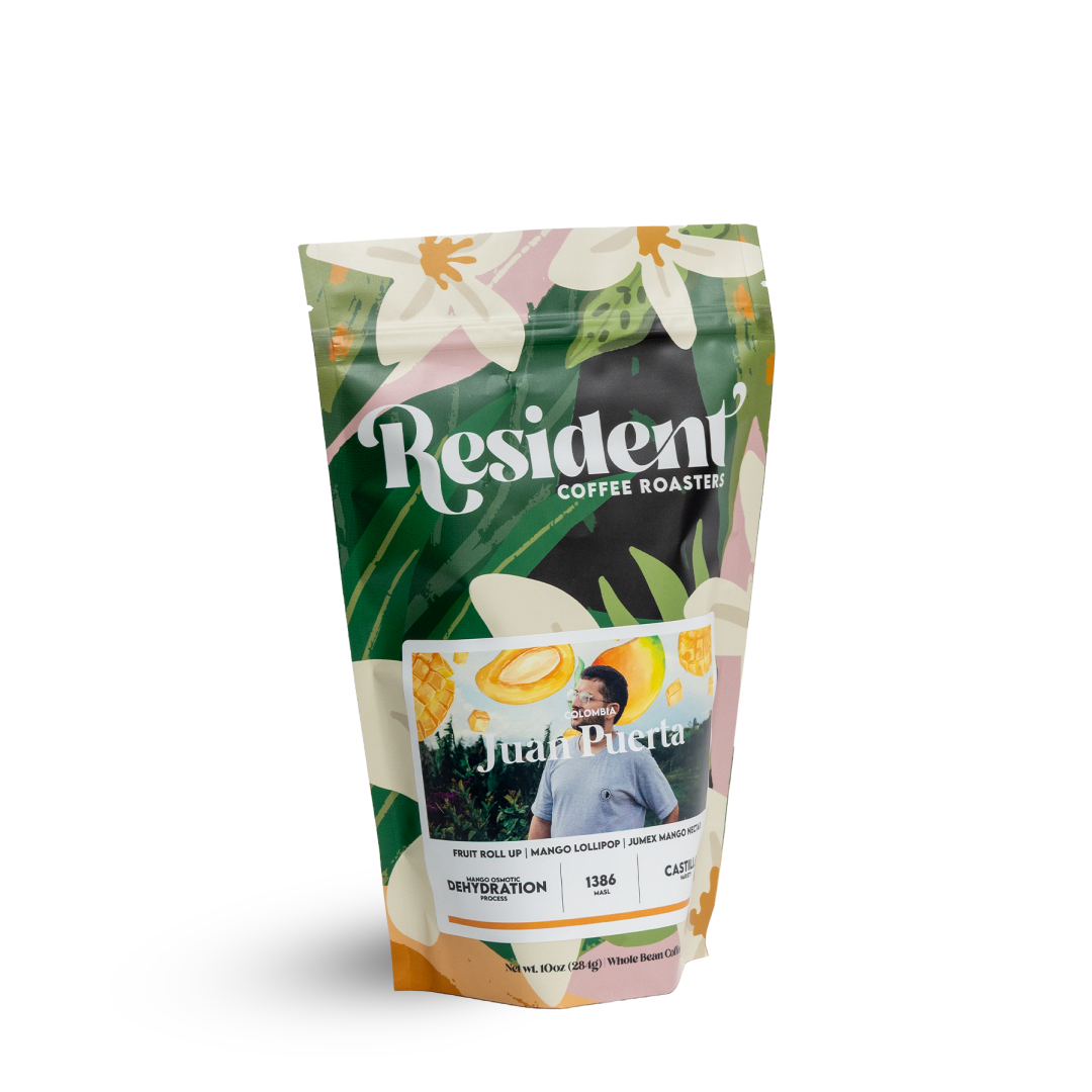 Resident Coffee Juan Puerta Mango bag with floral design and illustrated fruit accents.