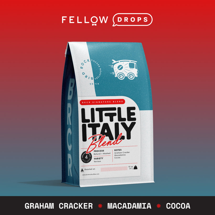 A bag of Bird Rock Coffee Roasters Little Italy Blend on a red and blue gradient background. - media