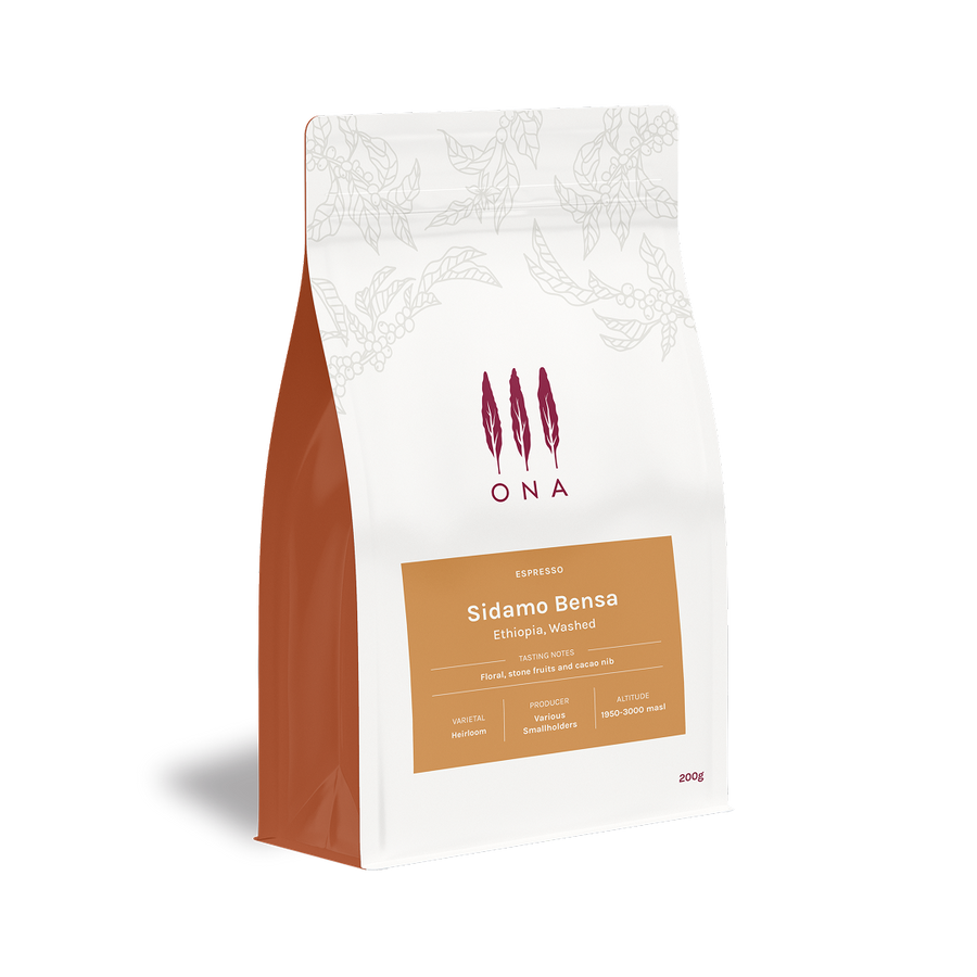White and orange Fellow bag labeled Ethiopia Bensa Sidamo washed coffee. - media