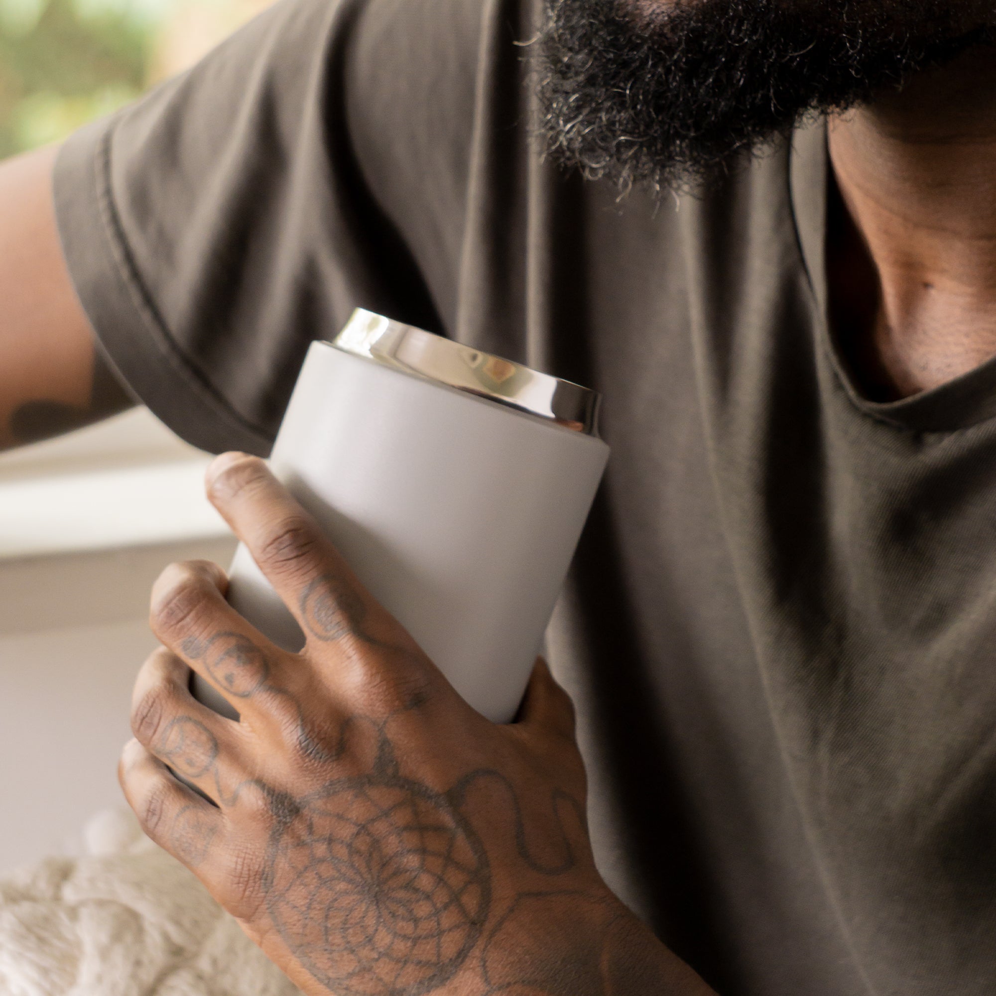 Lifestyle image of gray mug