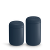 Two matte dark blue containers with rounded lids, perfect for a stylish home barista design.