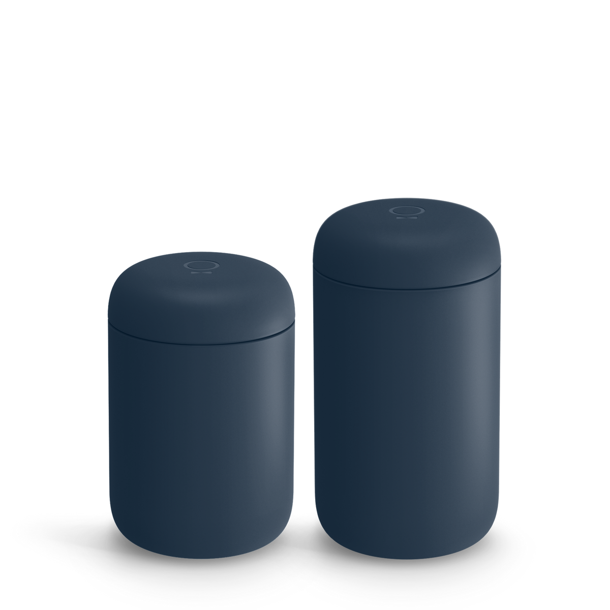 Two matte dark blue containers with rounded lids, perfect for a stylish home barista design.
