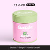 Pink Ouatcha Matcha Starter Ceremonial tin with a green lid.