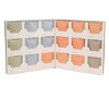 Open Dona Tea Library box displaying an organized collection of twelve assorted tea sachets.