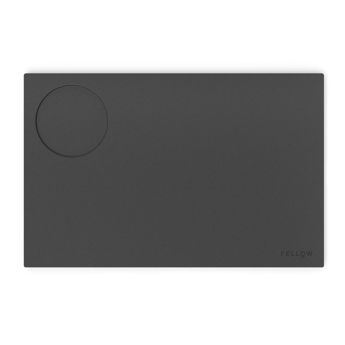 Fellow Espresso Tamping Mat: black silicone, rectangular with a circular indent and logo.