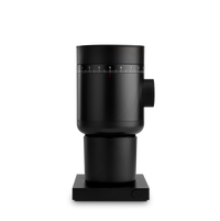 Fellow Opus 2 Conical Burr Grinder in matte black, shown on a square base. - media thumbnail