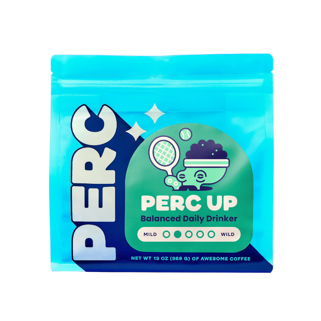 Blue bag of PERC Perc Up Tanzania Peaberry, cartoon cup with racket, single-origin coffee.