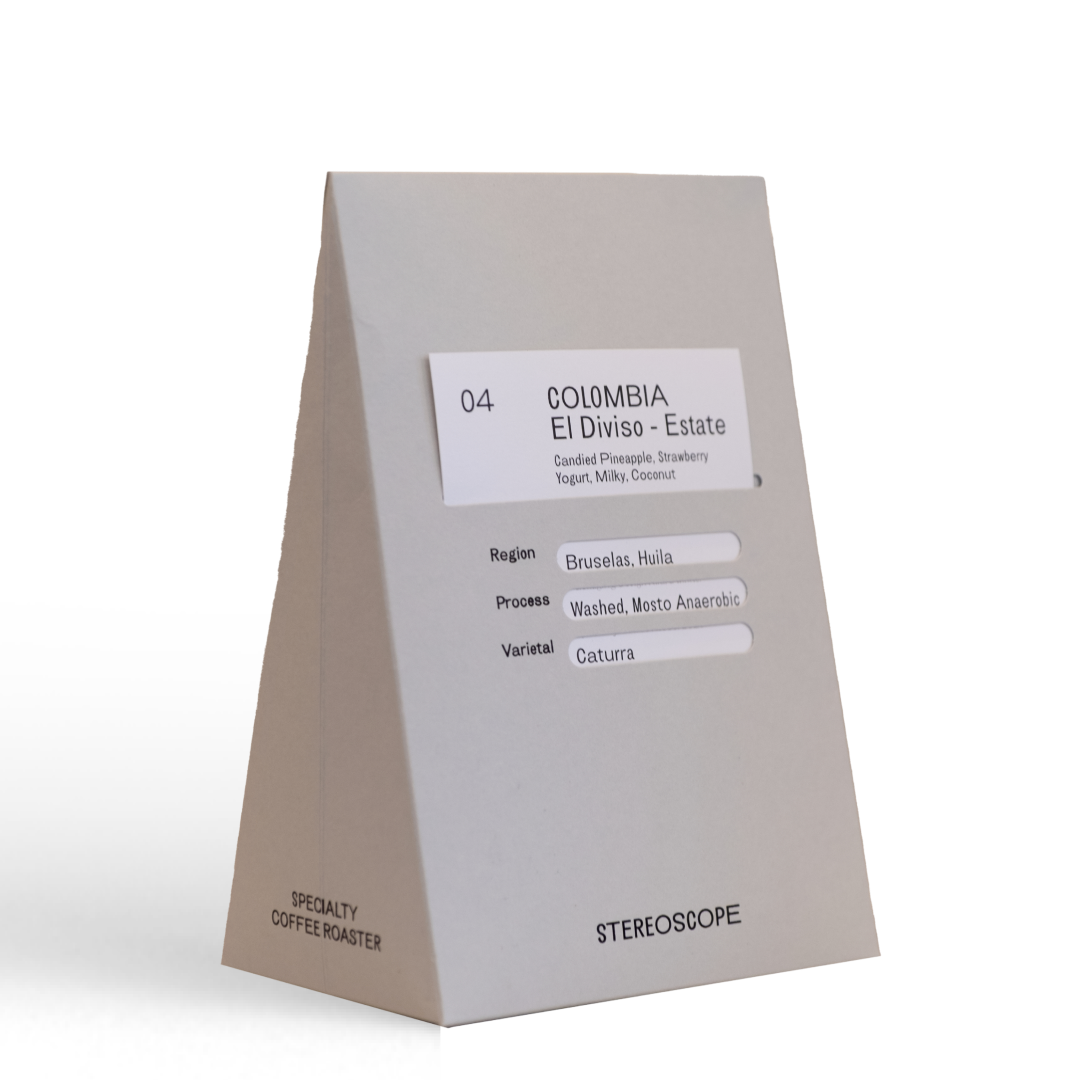 Grey coffee bag labeled stereoscope Colombia - Finca El Diviso - Estate with tasting notes.