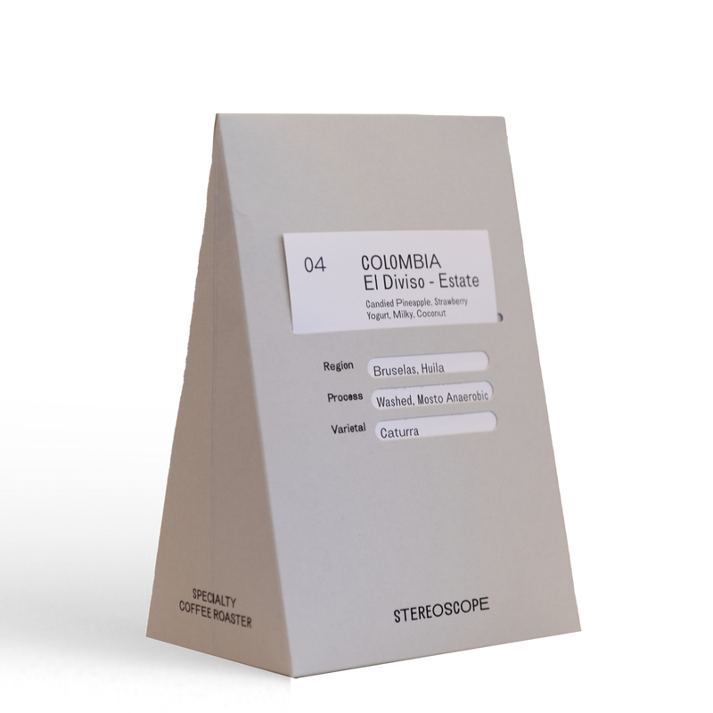 Grey coffee bag labeled stereoscope Colombia - Finca El Diviso - Estate with tasting notes.