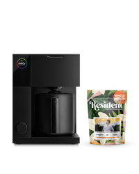 Fellow’s Aiden Cold Brew Starter Bundle sits beside Juli Puerta on a clean white background.