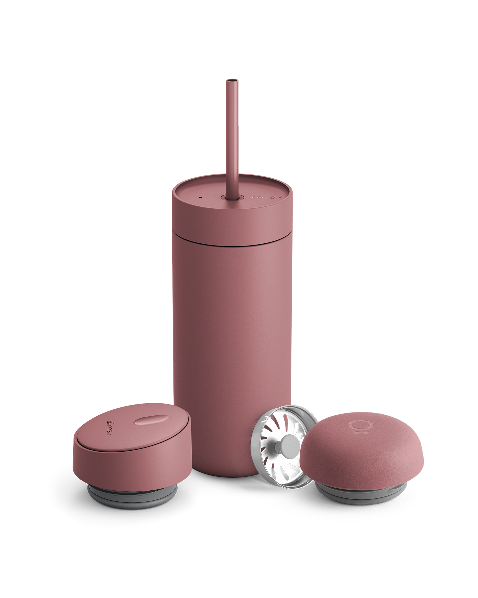Fellow Carter 3-in-1 Lid System matte pink mug with straw and two containers on white background.
