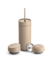 Fellow Carter 3-in-1 Lid System: beige mug with straw, two lids, and metal filter.