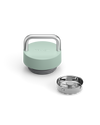 Fellow The Carry Lid in mint green with metal handle, shown beside removable metal strainer.