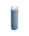 Fellow Carter Carry Travel Mug in Hazy Blue with a metal handle on a white background.