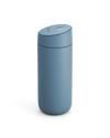 The Fellow Carter Slide Mug is a matte blue travel mug with a rounded lid, shown on white.