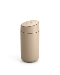 Fellow Carter Slide Mug, beige, with rounded lid on a white background. - media thumbnail