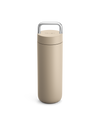 Fellow Carter Carry Travel Mug in Sand Dune with silver handle on a white background.