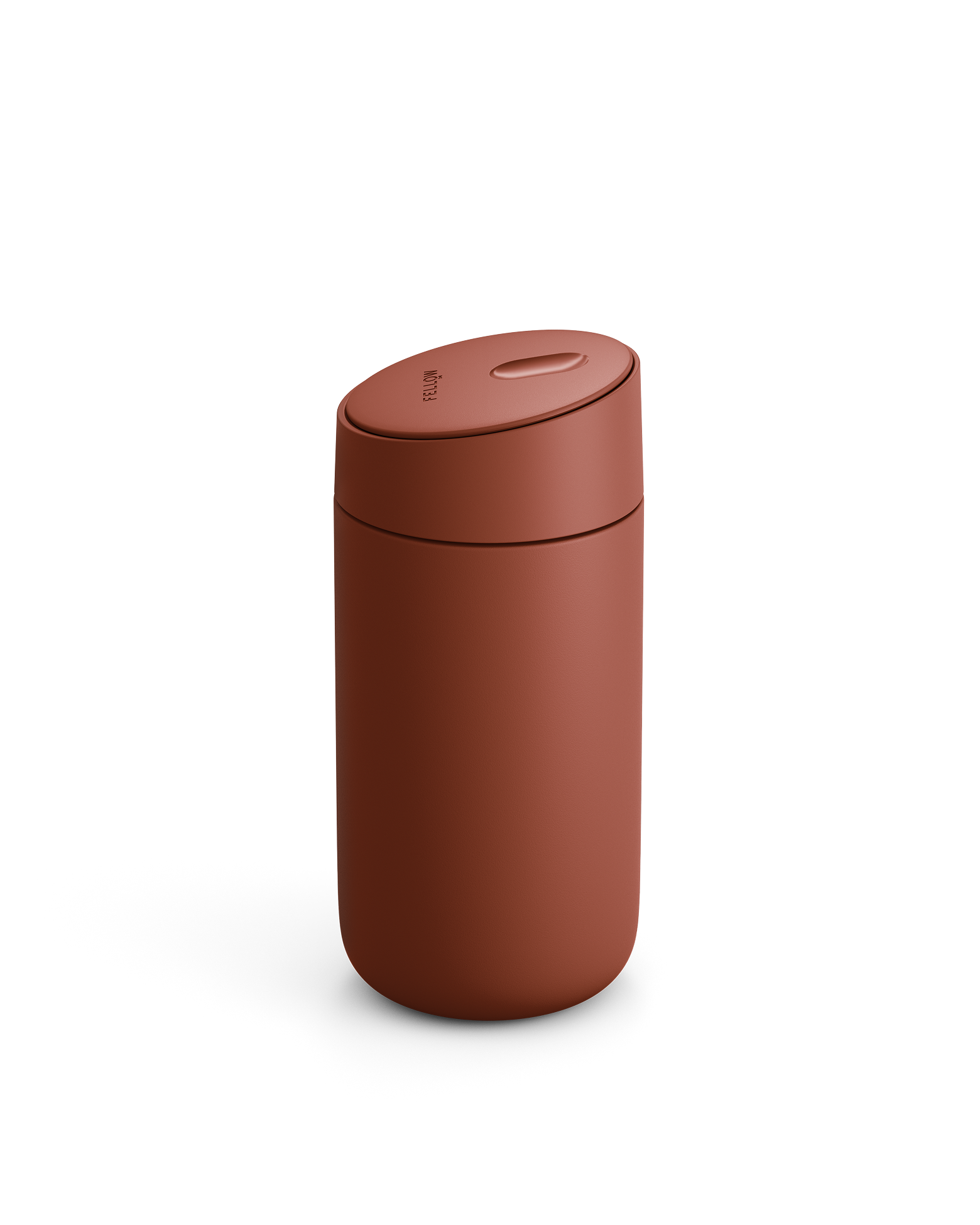 A matte rust-red Carter Slide Mug by Fellow with a rounded lid on a white background.