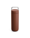 The Fellow Carter Carry Travel Mug in Sienna, shown with silver handle, on a white background.