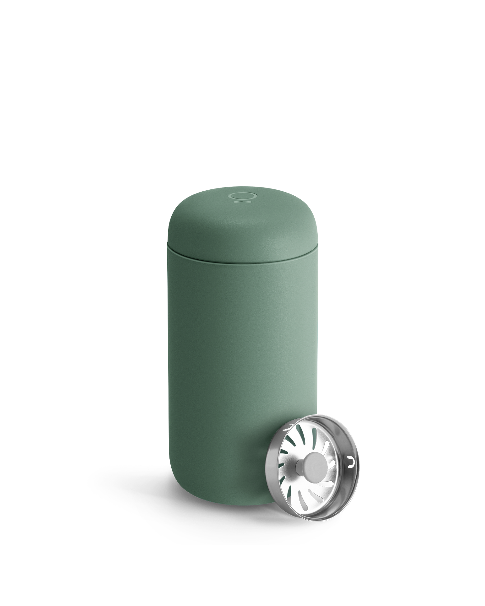 Matte green Fellow Carter Move Mug with lid and metal strainer in front.